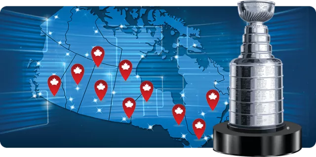 Map of Canada with pins on it, and the Stanley Cup. 